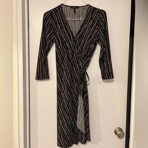 BCBG Women’s black/brown/beige striped wrap dress. Size M. Barely worn!